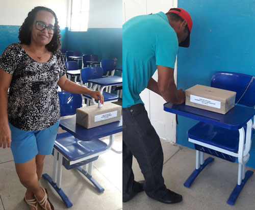 Serg 3 EXERCENDO CIDADANIA - ESCOLAS DE QUEIMADAS/BA ELEGEM SEUS DIRETORES E Servidora pública e pai de aluno votando | Foto: Divulgação