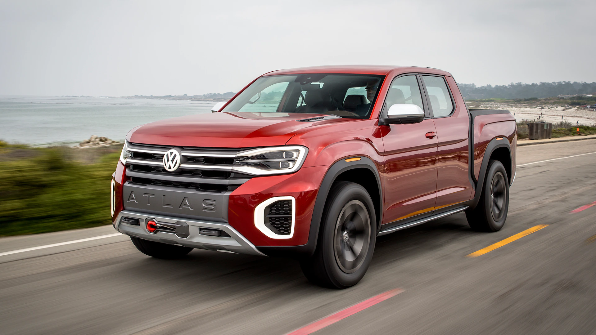 Volkswagen Atlas Tanoak Truck Concept front three quarter in motion 11