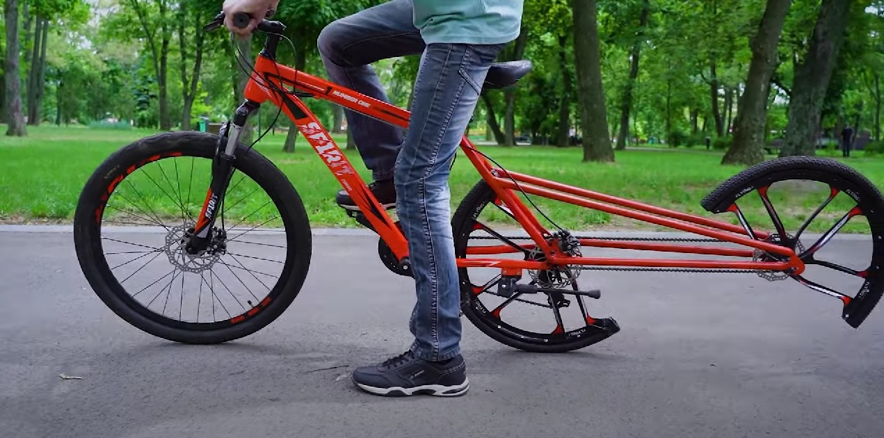 guy reinvents the wheel cuts it in half to make a fully functional bike 6
