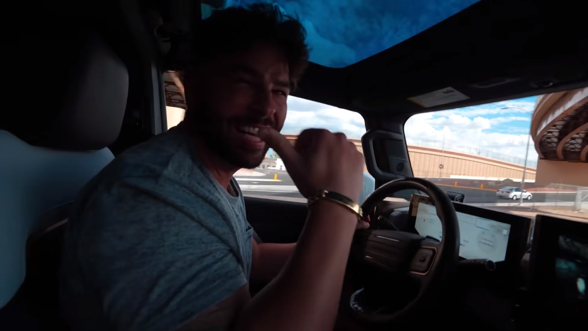 watch youtuber totals brand new gmc hummer ev the first day he drives it 3